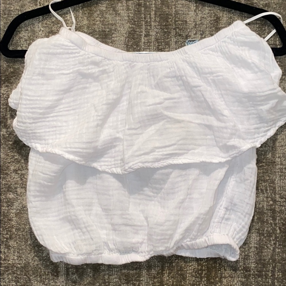 White sleeveless top